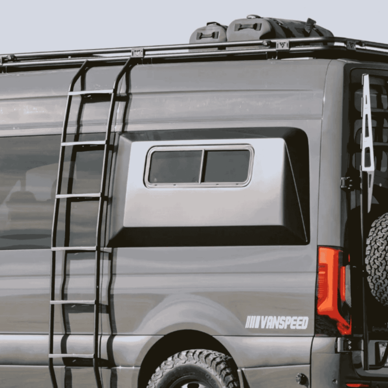 Grey VanSpeed capsule attached to camper van for added sleeping space