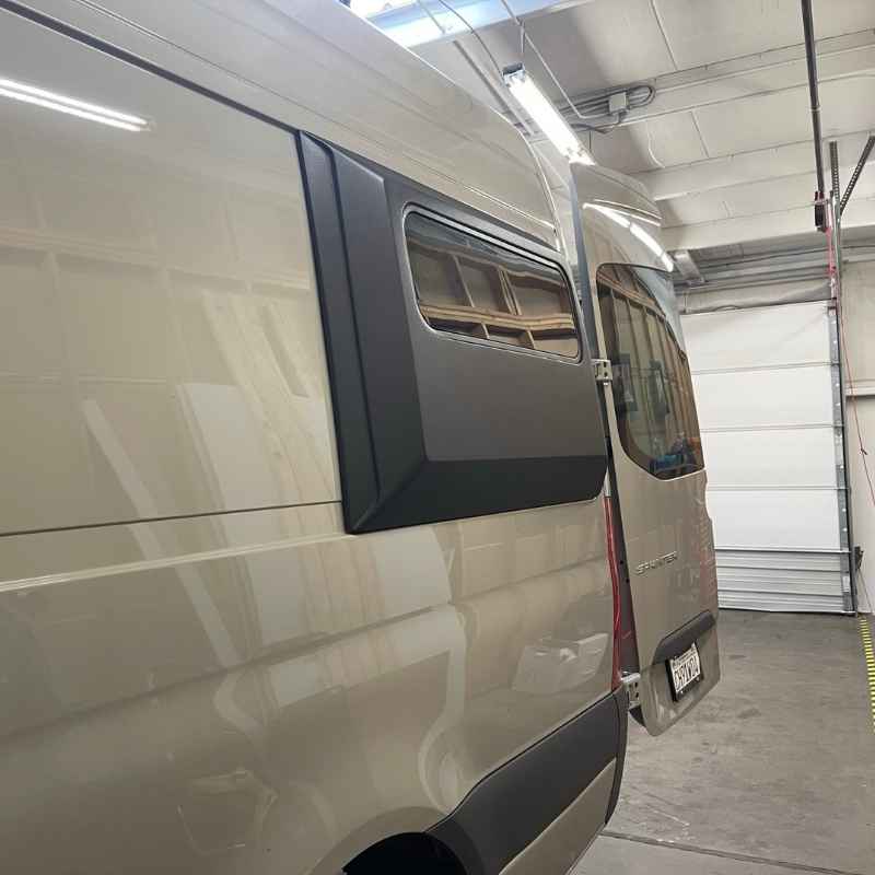 Black VanSpeed capsule mounted on van to expand interior space