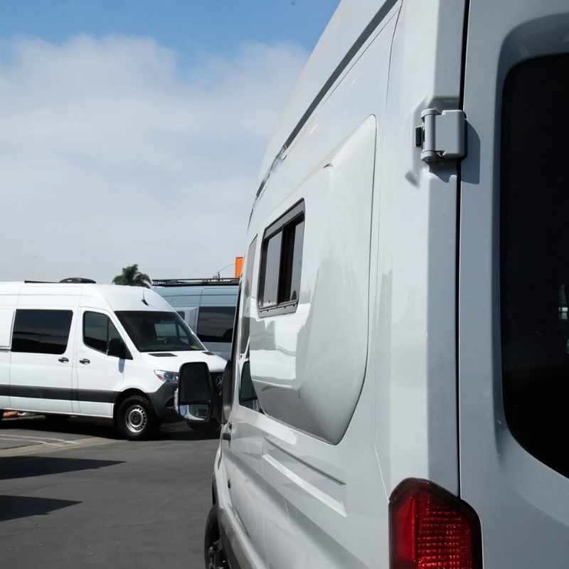 White VanSpeed capsule with window installed on a camper van for added interior space